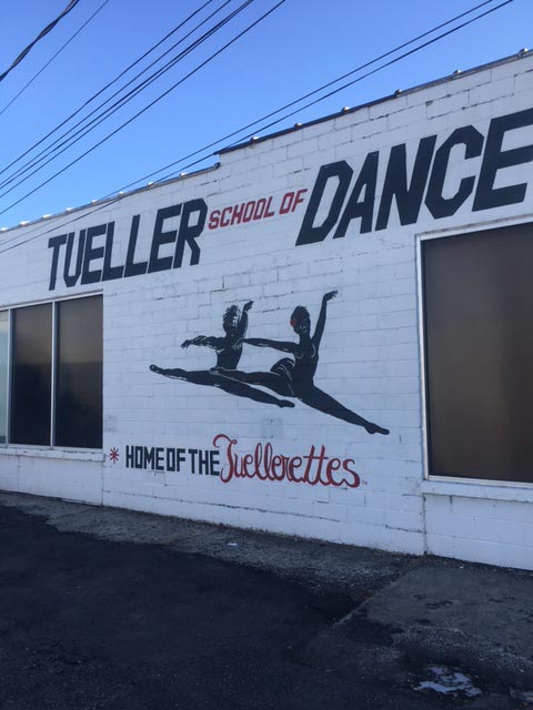 The painted Tueller School of Dance mural on the studio building